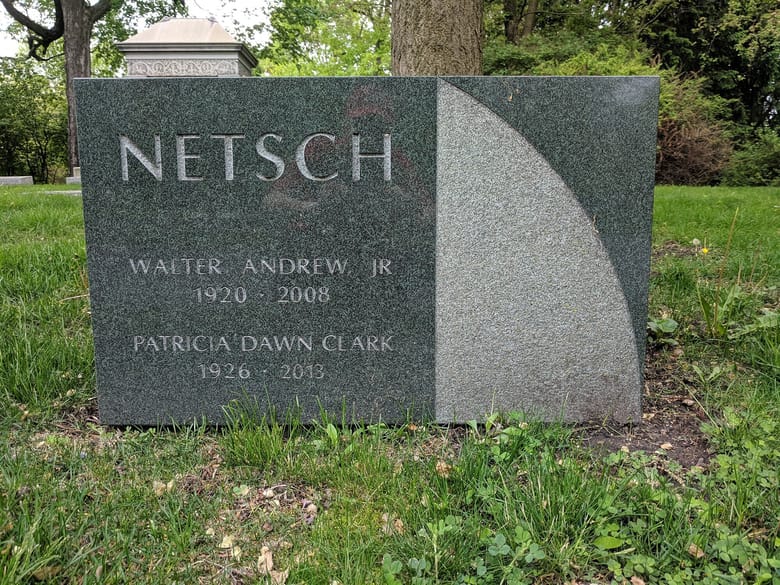 A photo of a shiny headstone marking the Dawn Clark Netsch grave
