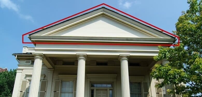 Front view of the historic Clarke-Ford House with prominent triangular pediment
