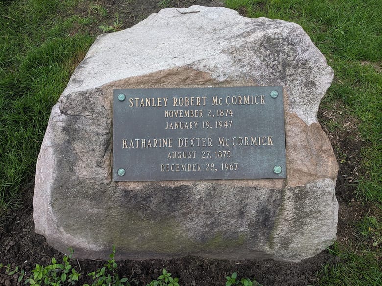 A photo of a stone with a plaque that reads: Gravestone of Katherine Dexter McCormick