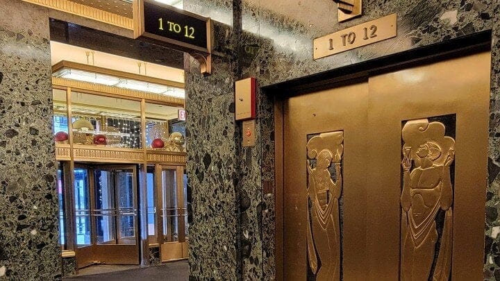 Interior view of brass elevator door.